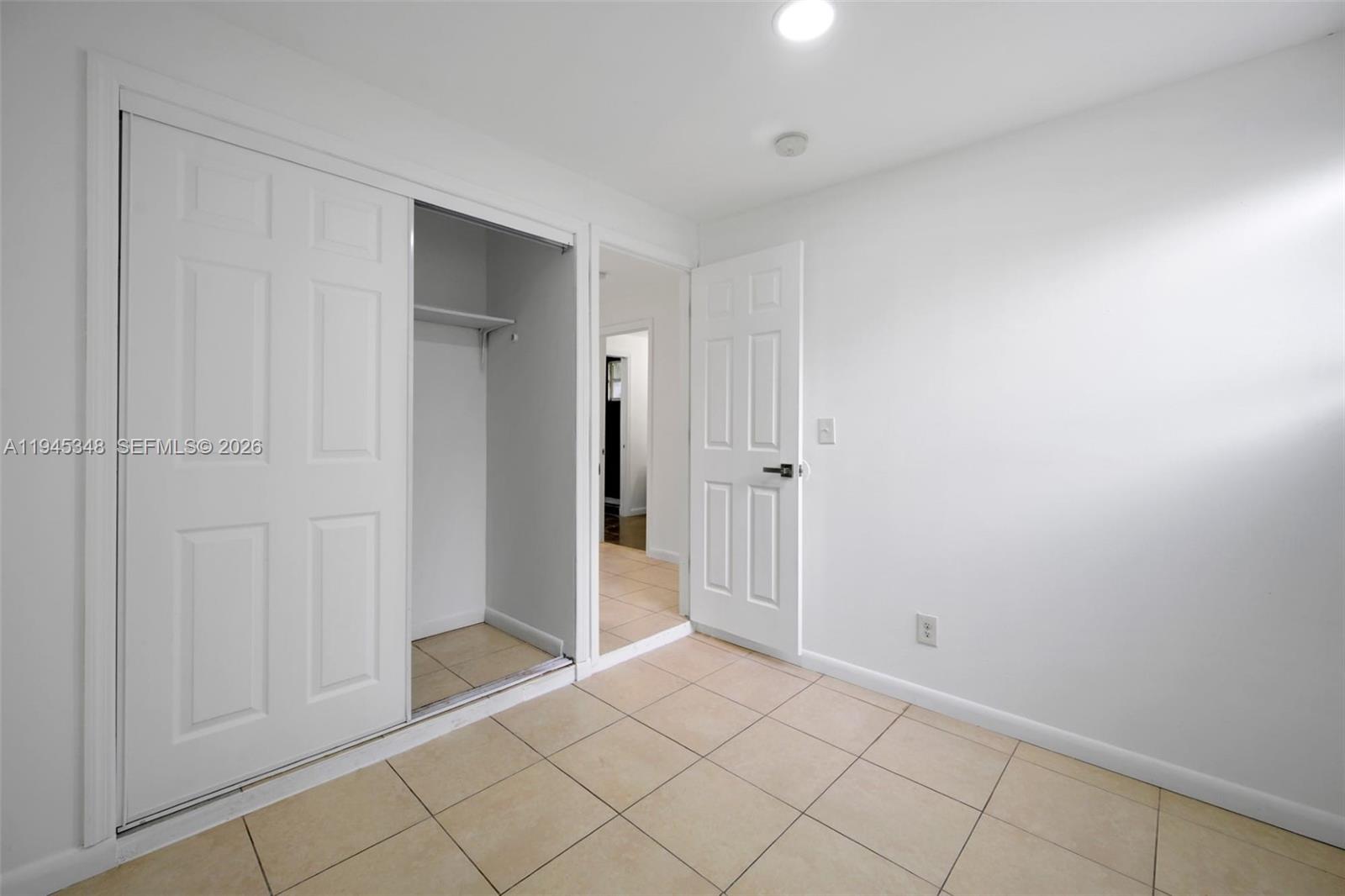348 Northeast 58th Street Miami, FL 33137 - Photo 13 of 16 a view of an empty room