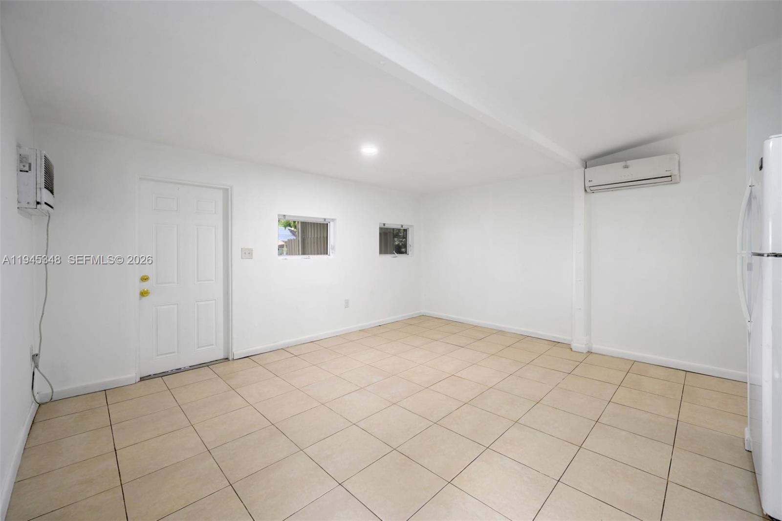 348 Northeast 58th Street Miami, FL 33137 - Photo 2 of 16 a view of an empty room