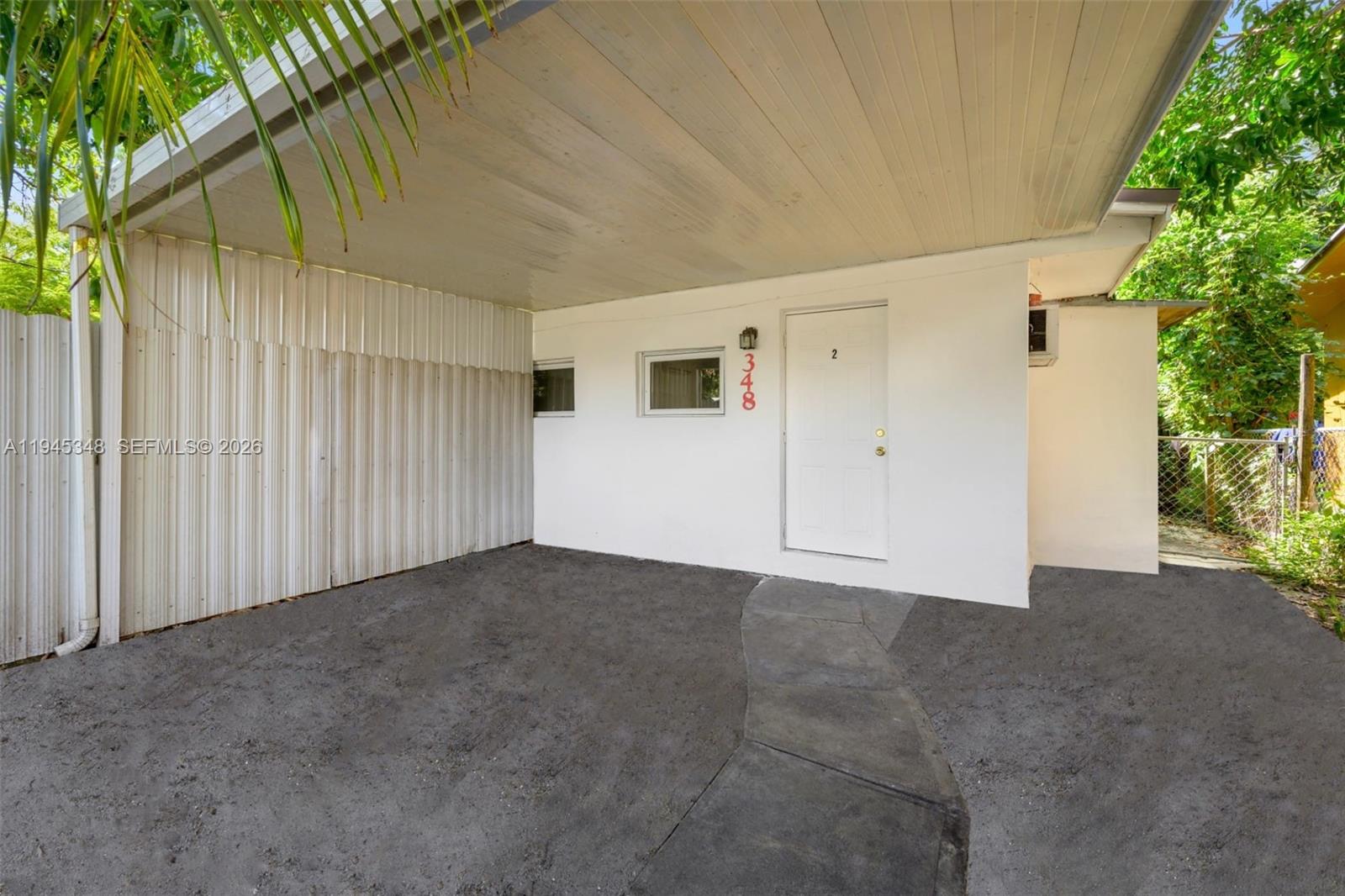 348 Northeast 58th Street Miami, FL 33137 - Photo 4 of 16 a view of a backyard