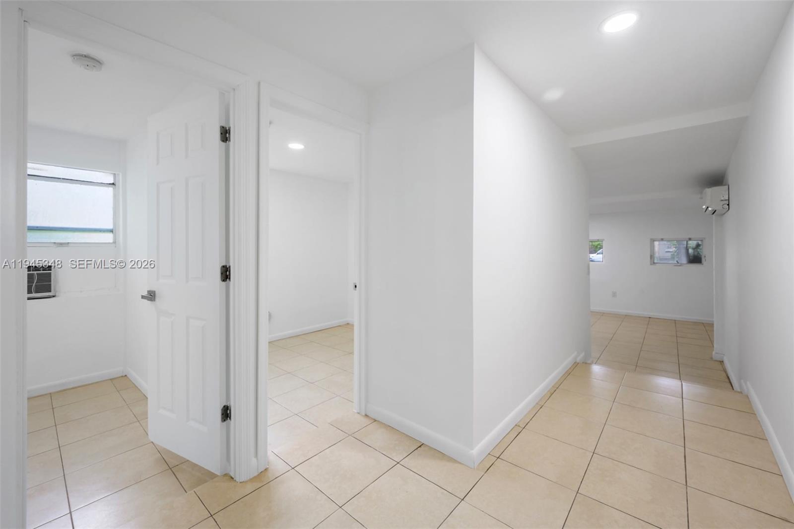 348 Northeast 58th Street Miami, FL 33137 - Photo 9 of 16 a view of a hallway with closet and bathroom