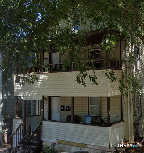 a view of a house with a patio