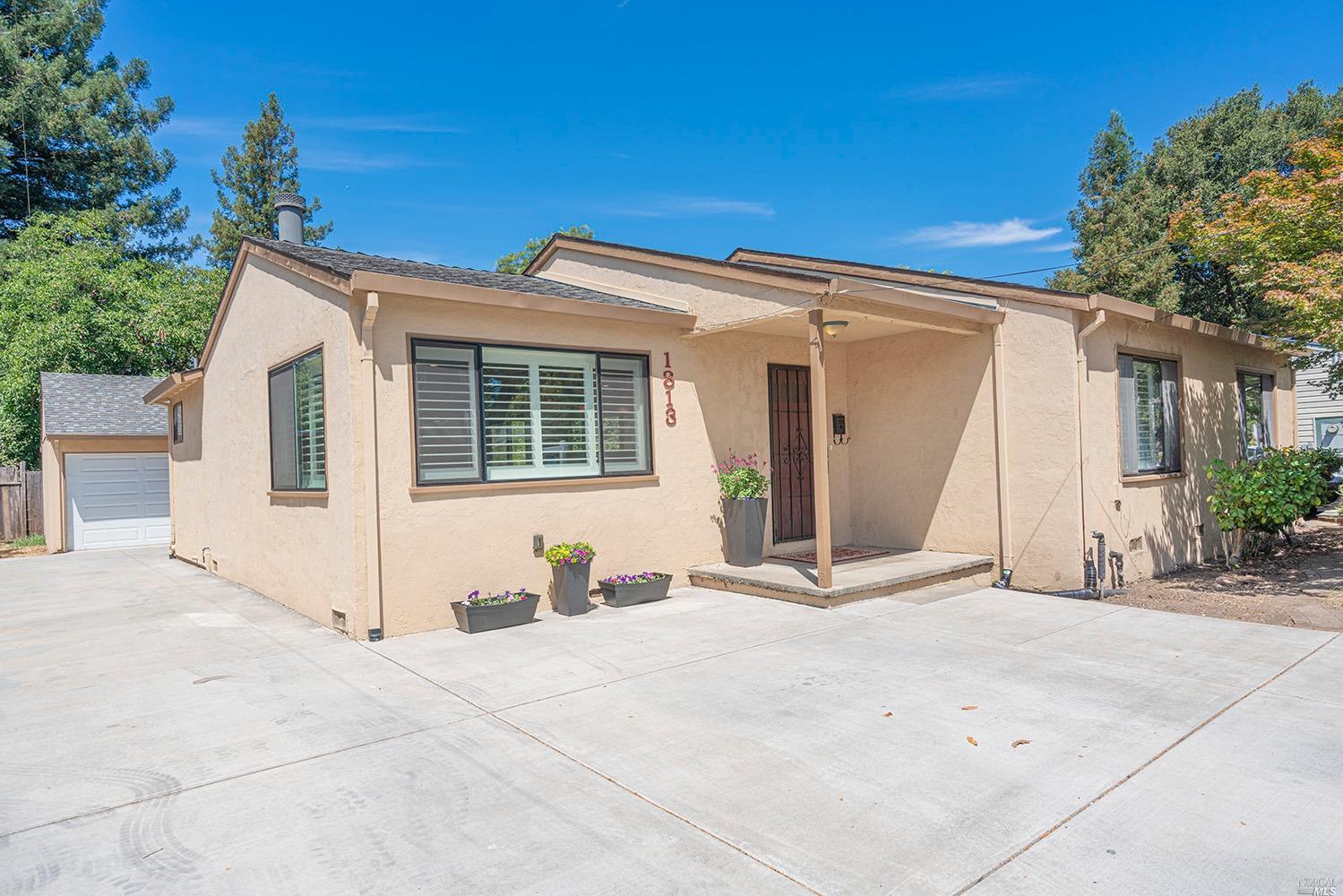 1813 Wright Street Santa Rosa, CA 95404 - Photo 1 of 1 a view of a house with backyard and trees