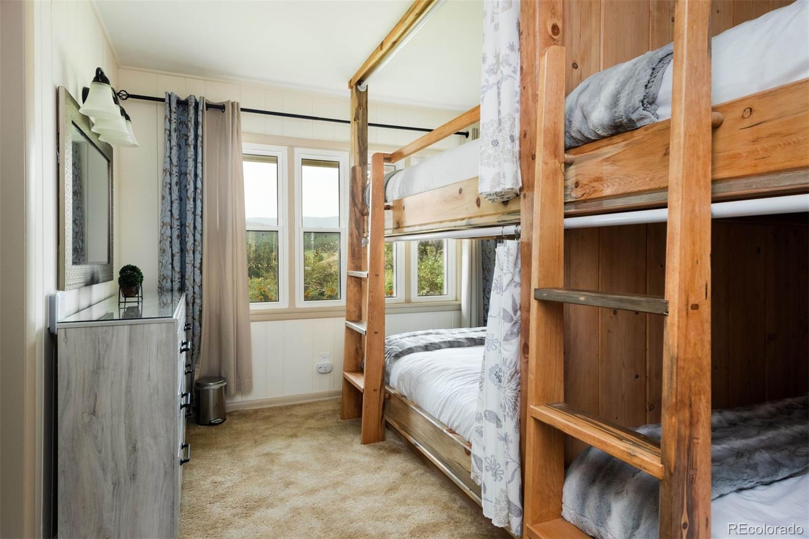 64057 US Highway 285 Bailey, CO 80421 - Photo 39 of 50 a bedroom with a bed and a window