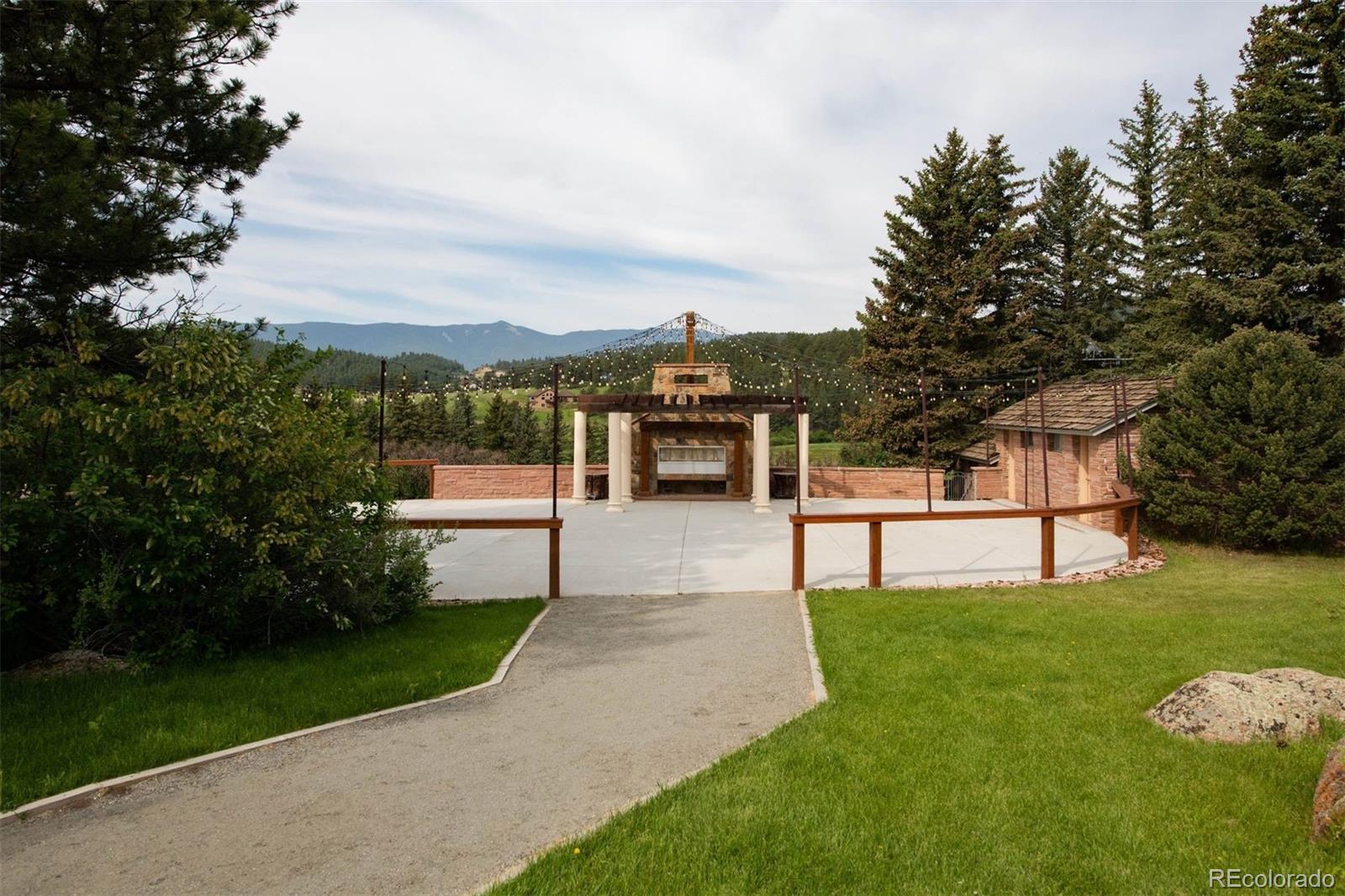 64057 US Highway 285 Bailey, CO 80421 - Photo 42 of 50 a view of a garden with an outdoor seating