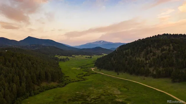 a view of a lake with a mountain in the background