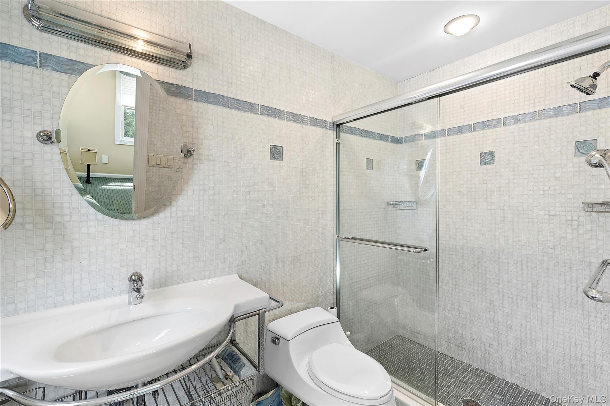54 Breezy Point Road Wading River, NY 11792 - Photo 13 of 17 Updated full primary ensuite bathroom
