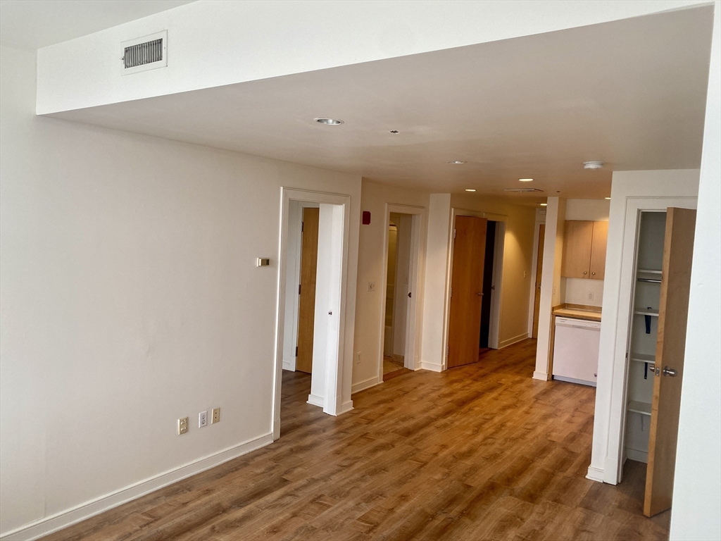 131 Tremont Street, Unit 5B Boston, MA 02111 - Photo 11 of 24 a view of entryway with wooden floor