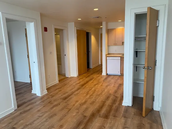 a view of livingroom with wooden floor