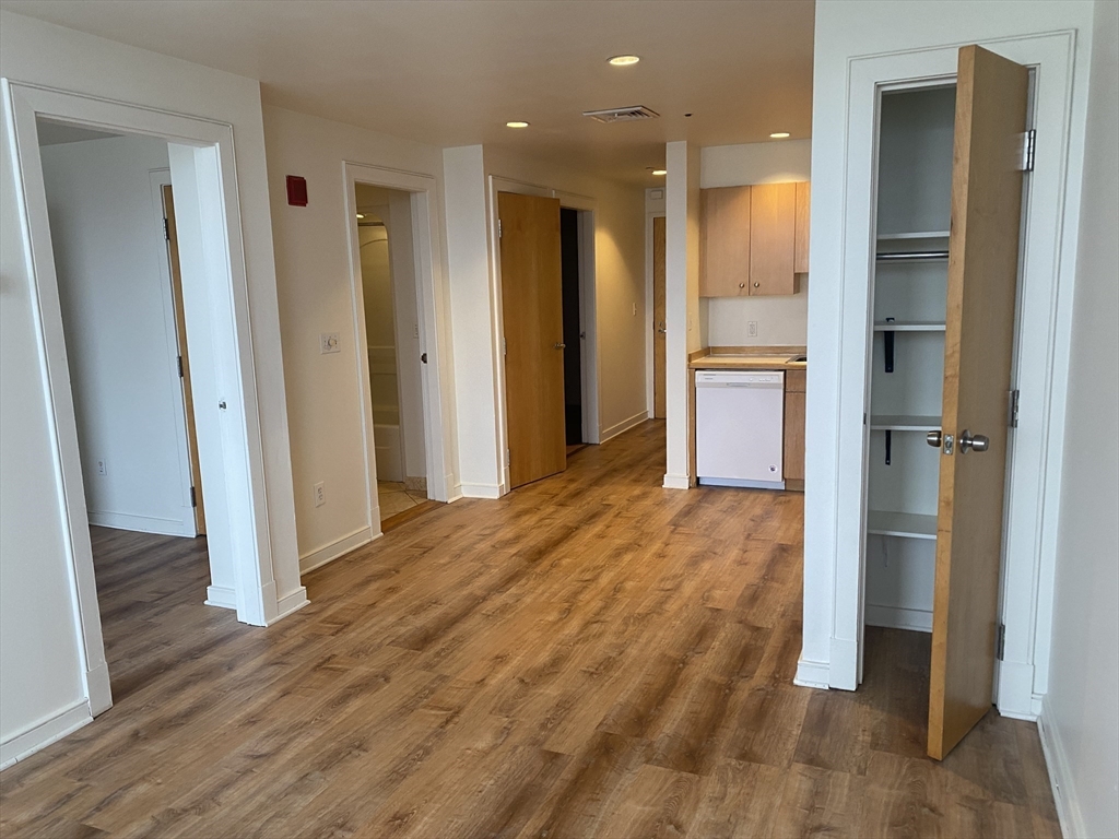 131 Tremont Street, Unit 5B Boston, MA 02111 - Photo 12 of 24 a view of livingroom with wooden floor