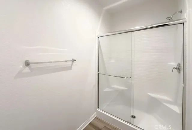 a bathroom with a sink a toilet a mirror and vanity