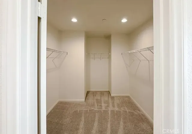 a view of empty room with windows