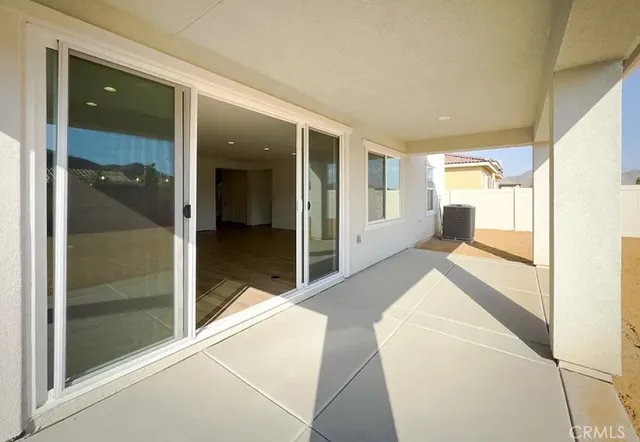 a view of lot of kitchen and an empty room