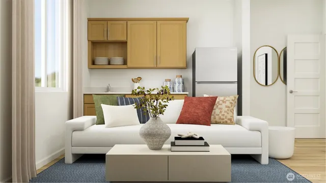 a living room with furniture and a window