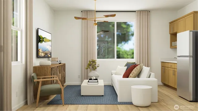 a living room with furniture and a large window