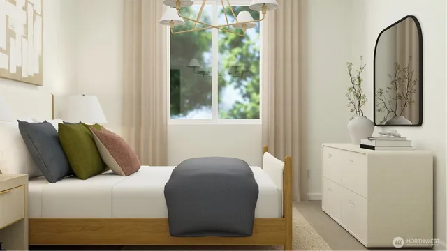 a bedroom with a bed and a mirror