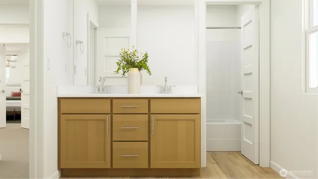 a bathroom with a shower and a mirror