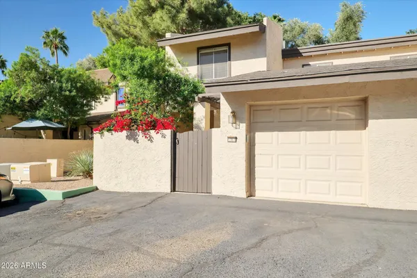 a view of a house with a garage