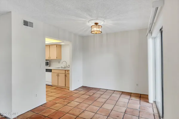 a view of a kitchen with a sink