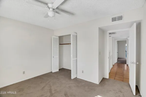 an empty room with a bathroom