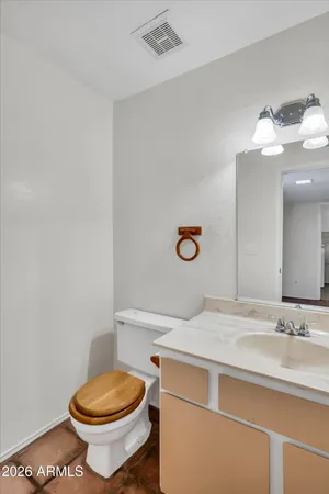 a bathroom with a sink and a toilet