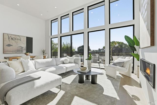 a bedroom with a bed and a potted plant