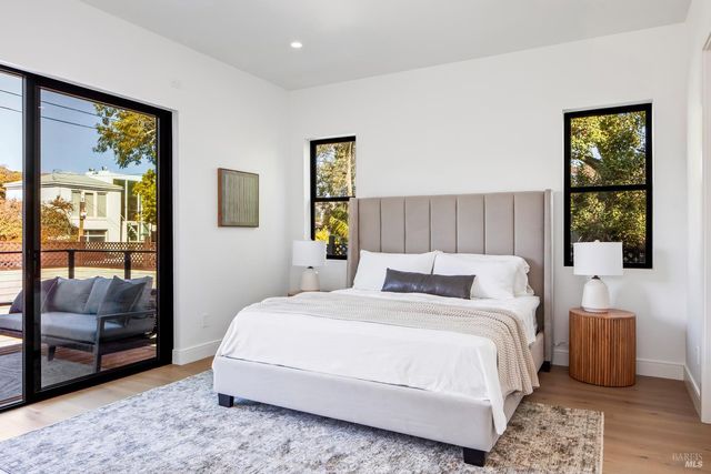 a view of living room filled with furniture and window