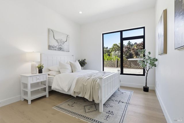 a living room with furniture or couch and a dining table
