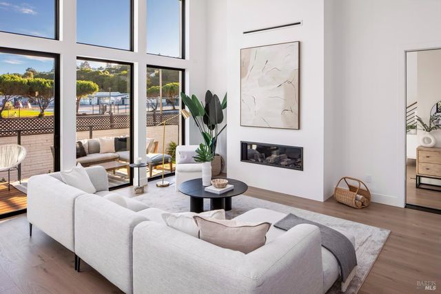 a front view of a house with sitting area