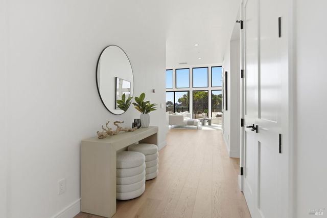 a kitchen with a table and chairs in it