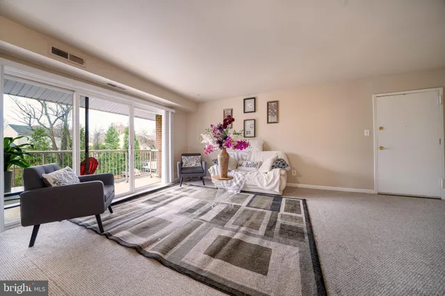 a balcony with chairs