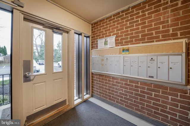 a view of entryway with a door