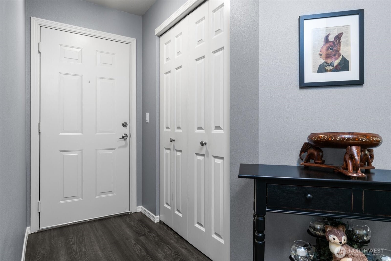 723 114th Street Southwest, Unit Y203 Everett, WA 98204 - Photo 13 of 35 a view of a hallway with wooden floor and closet