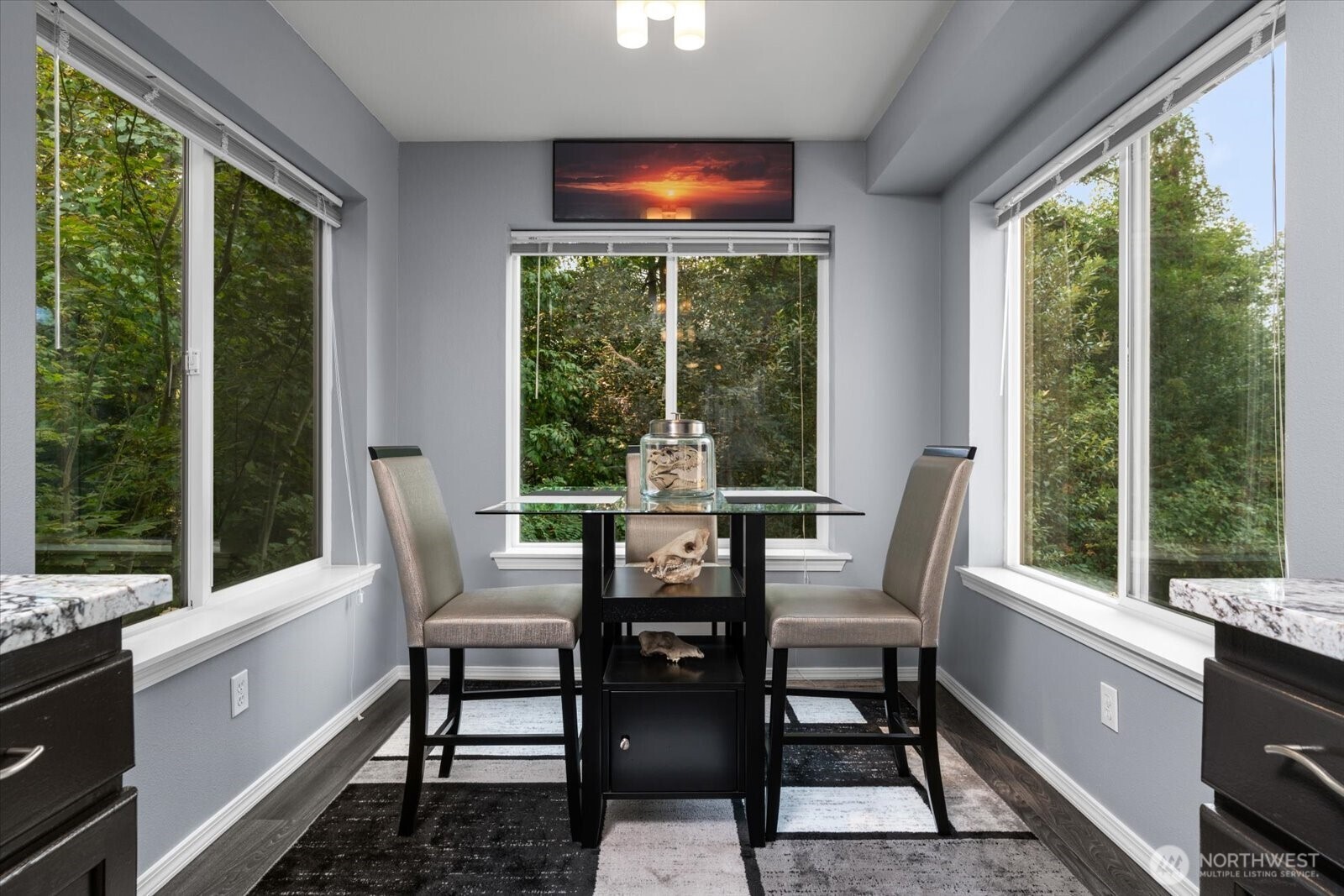 723 114th Street Southwest, Unit Y203 Everett, WA 98204 - Photo 8 of 35 a table and chairs in a room with a window