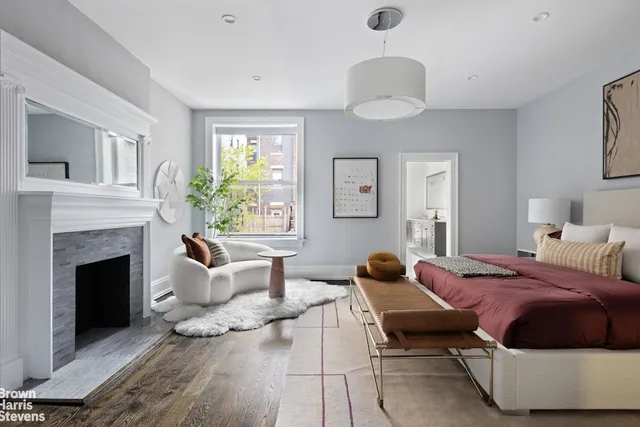 a view of a brick building with many windows