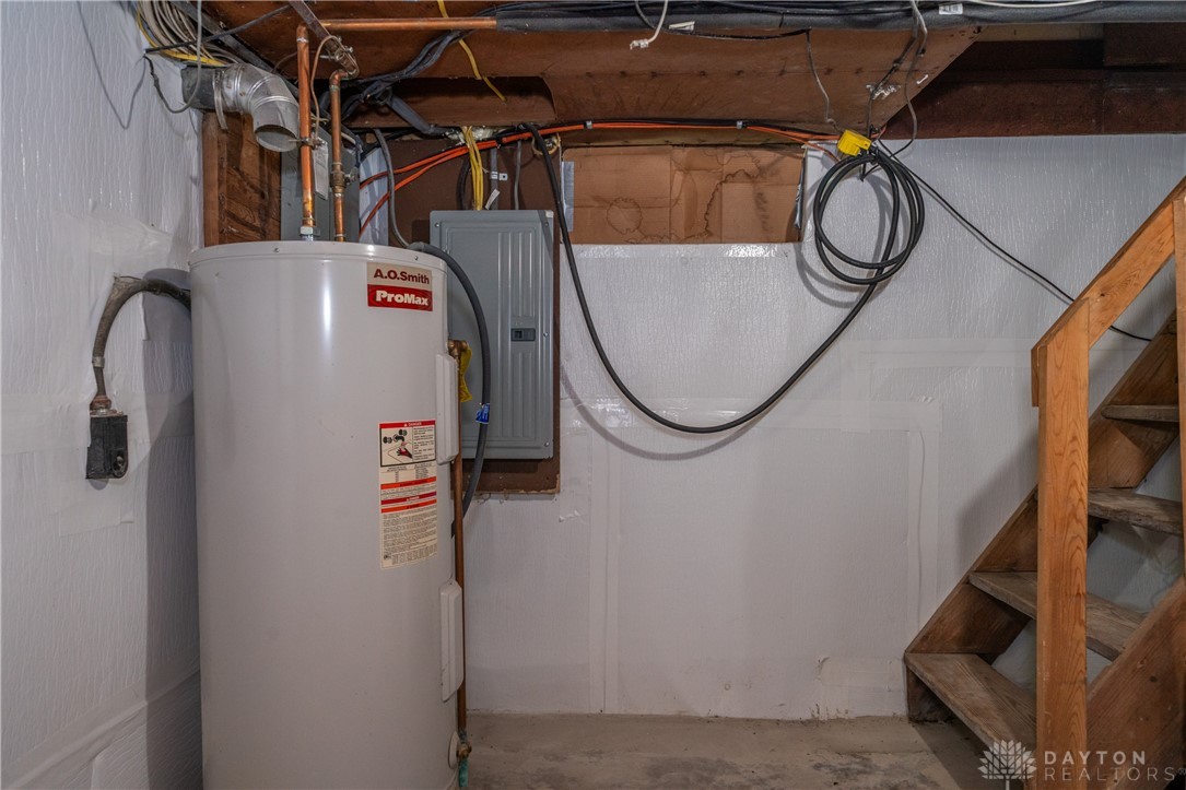 1599 Garringer Road Jamestown, OH 45335 - Photo 34 of 73 This functional basement provides essential utilities and convenient access to upper levels.