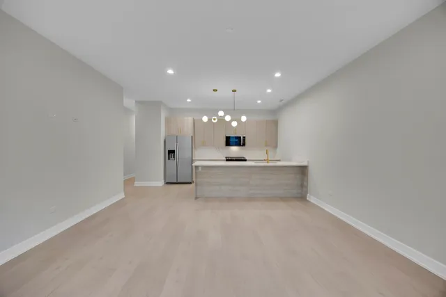 a view of kitchen and kitchen island