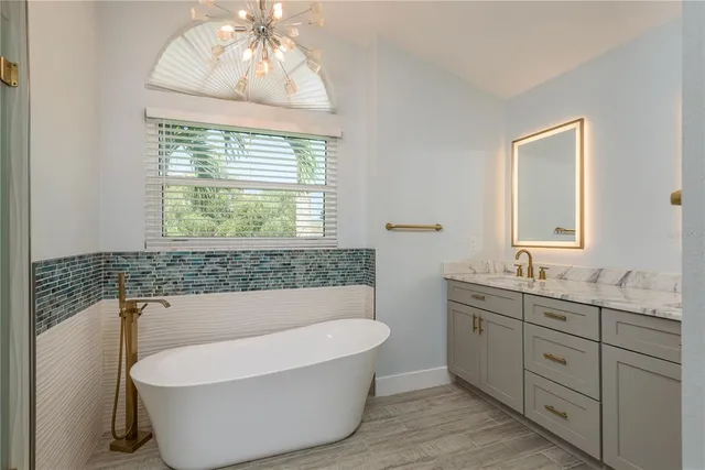 $499,900 | 161 Lake Shore Drive West, Palm Harbor, FL 34684