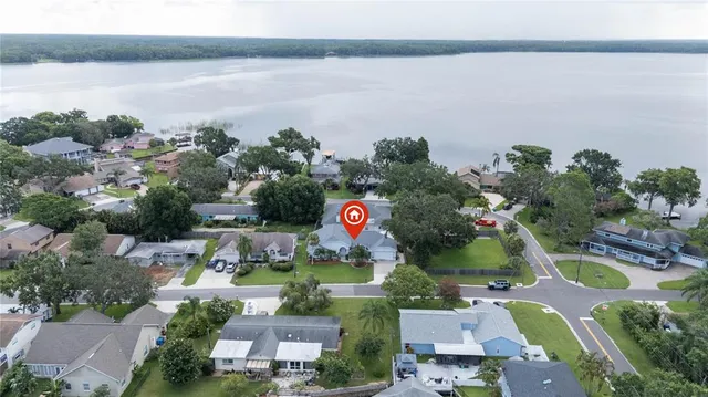 a room with wooden floor and furniture
