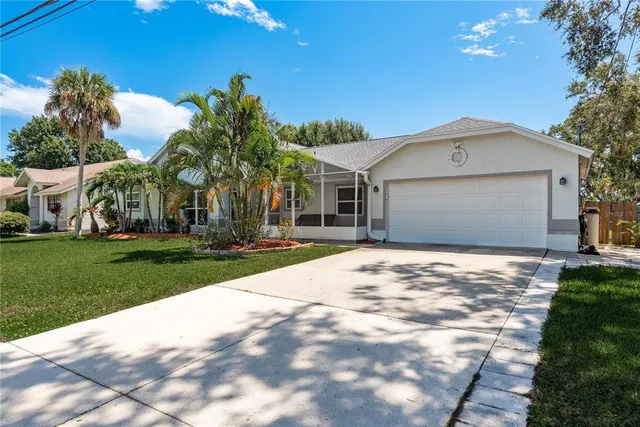 $499,900 | 161 Lake Shore Drive West, Palm Harbor, FL 34684