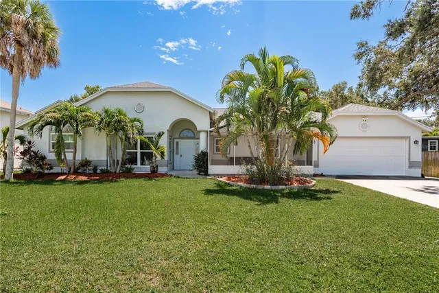 $499,900 | 161 Lake Shore Drive West, Palm Harbor, FL 34684