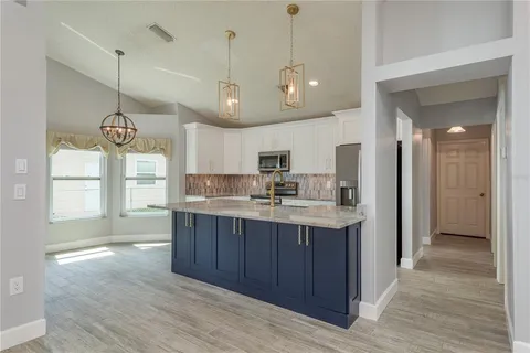 $499,900 | 161 Lake Shore Drive West, Palm Harbor, FL 34684