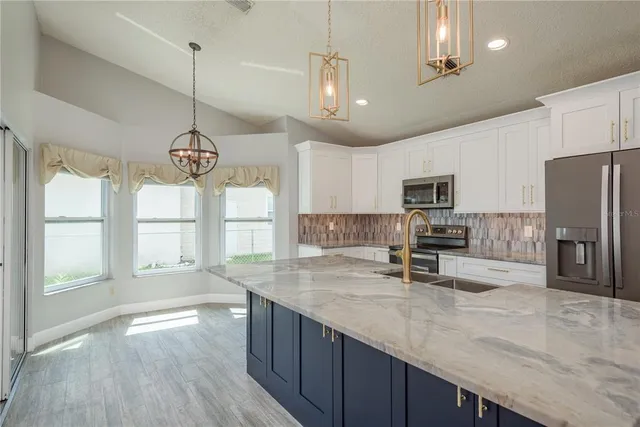 $499,900 | 161 Lake Shore Drive West, Palm Harbor, FL 34684