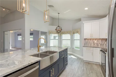 $499,900 | 161 Lake Shore Drive West, Palm Harbor, FL 34684