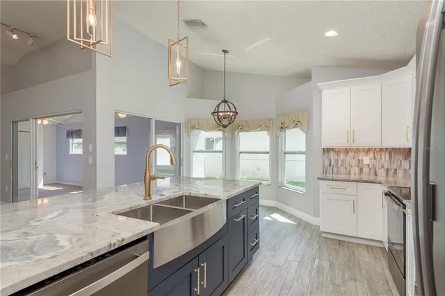 $499,900 | 161 Lake Shore Drive West, Palm Harbor, FL 34684