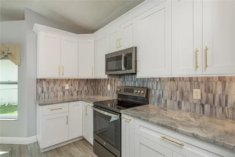 $499,900 | 161 Lake Shore Drive West, Palm Harbor, FL 34684