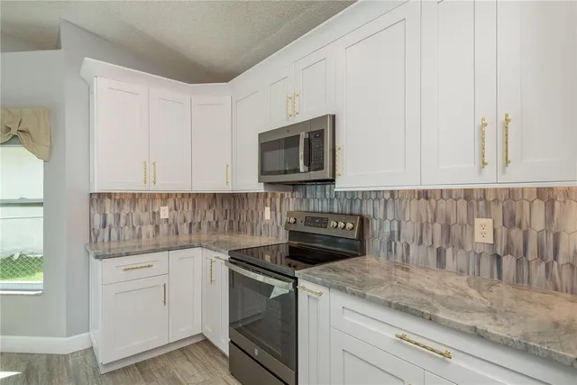 $499,900 | 161 Lake Shore Drive West, Palm Harbor, FL 34684