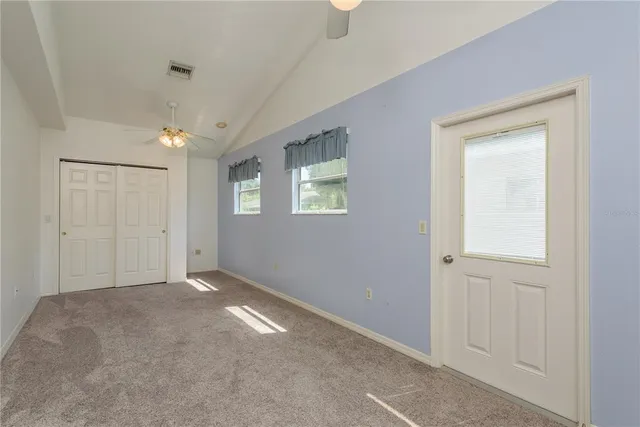 a view of a street with benches in the background