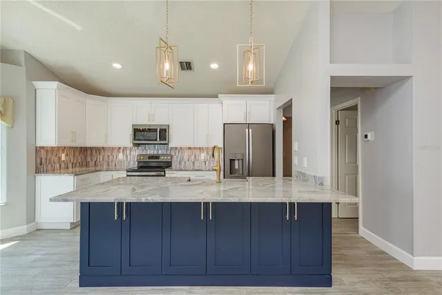 $499,900 | 161 Lake Shore Drive West, Palm Harbor, FL 34684