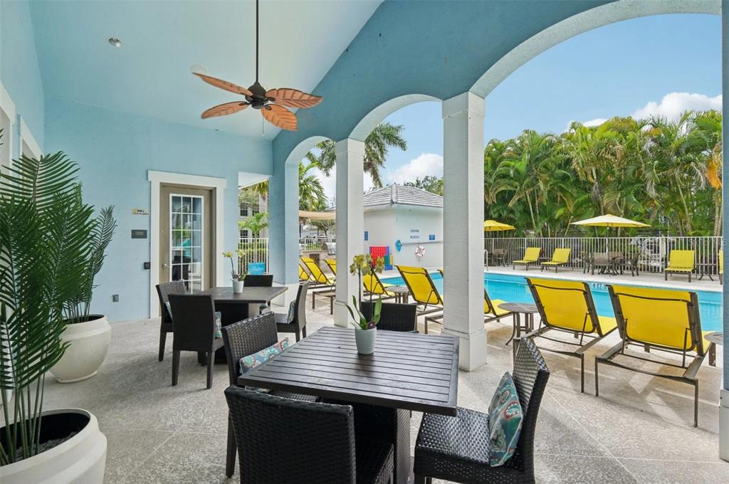 3334 South Bismark Lane, Unit 1B01304 Jupiter, FL 33458 - Photo 32 of 36 a view of a dining room with furniture window and outside view