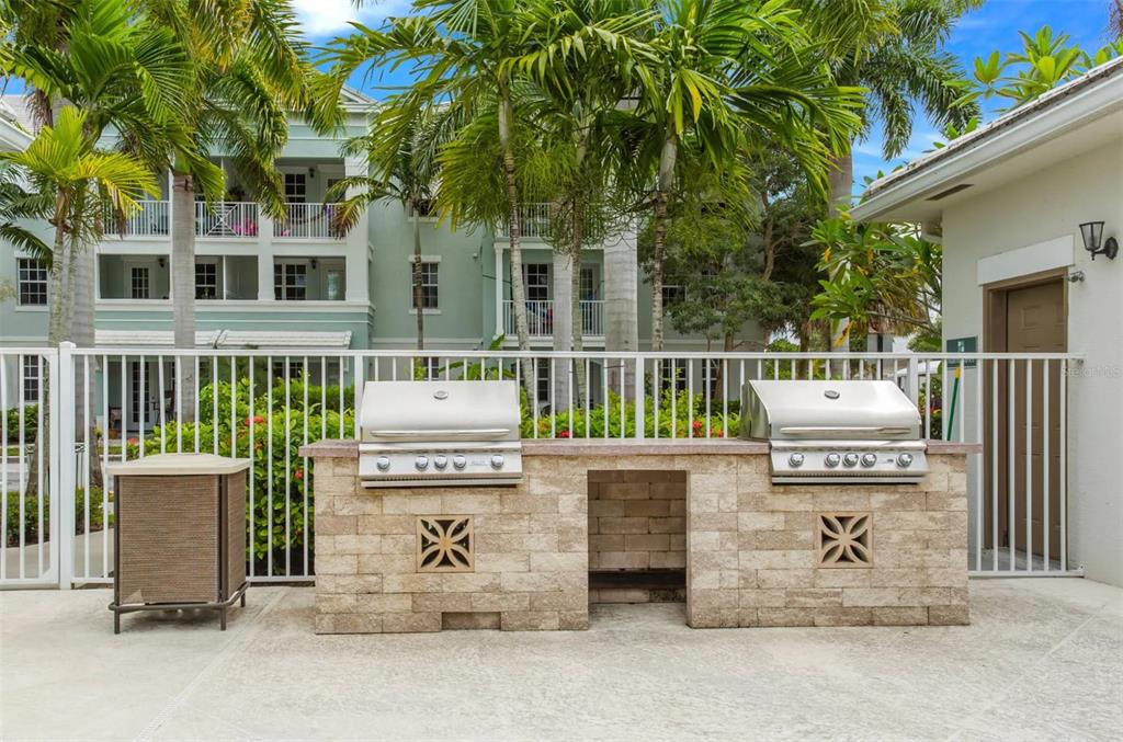 3334 South Bismark Lane, Unit 1B01304 Jupiter, FL 33458 - Photo 36 of 36 a front view of a house with a garden